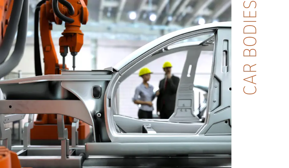  Robot arm works on a new car body in the production hall